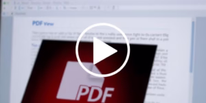Video play button on PDF document background.