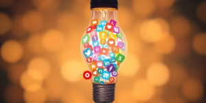 Lightbulb bursting with colorful social media icons.